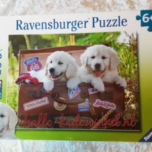 Puzzel honden in koffer